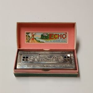 The Echo M. Hohner Harmonika in Silver with Box